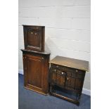 A GEORGIAN OAK FIELDED PANEL HANGING CORNER CUPBOARD, a smaller oak hanging cupboard, and an oak two