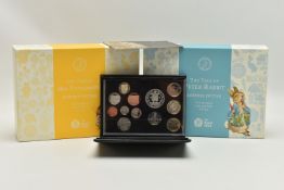 A CARDBOARD BOX OF ROYAL MINT COINAGE, to include a 2009 Proof Year Set that contains the Rare Kew
