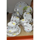 A ROYAL ALBERT 'MINUET' PATTERN TEA SET, comprising sugar bowl and milk jug, cake plate, six cups (