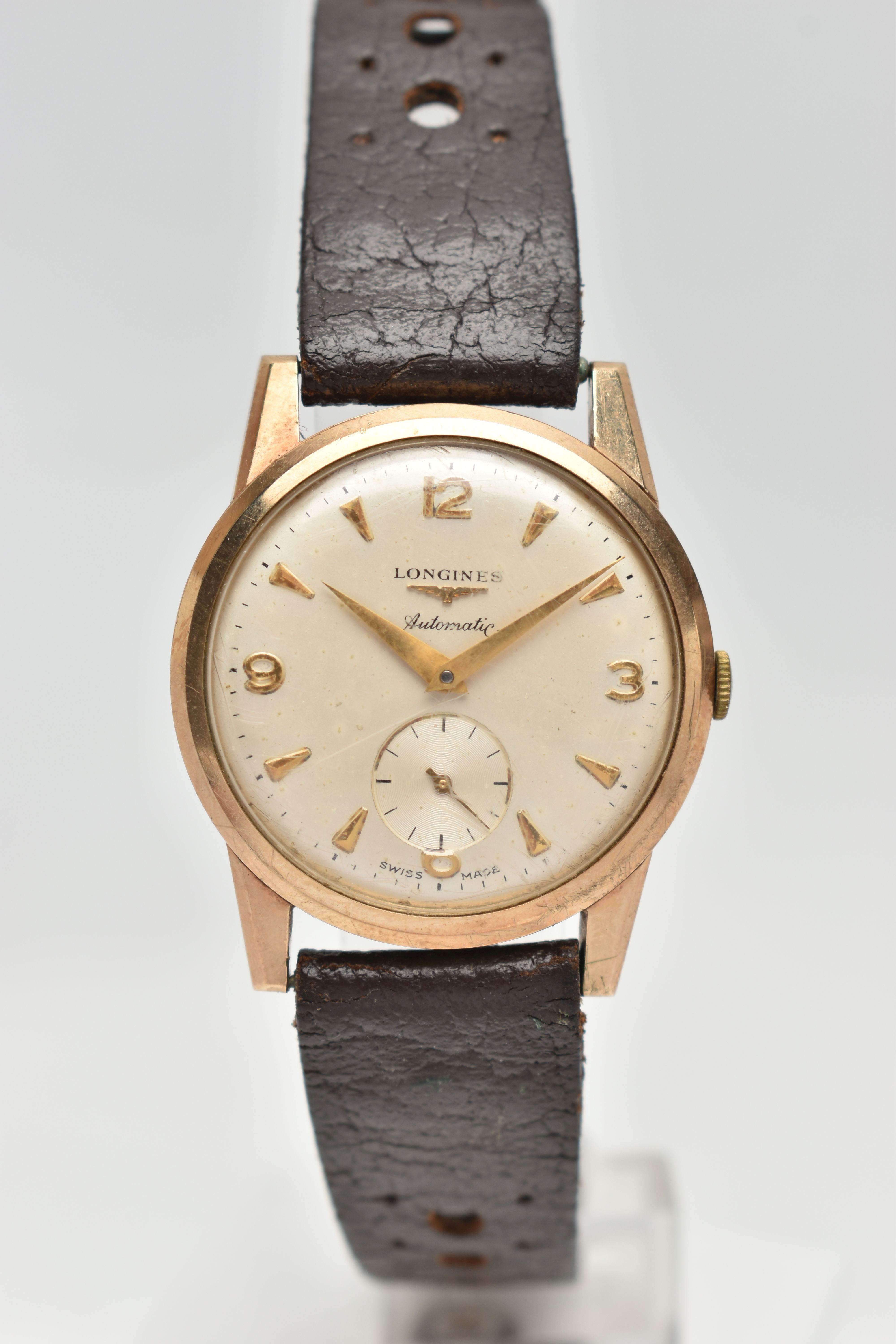 A GENTS 9CT GOLD 'LONGINES' AUTOMATIC WRISTWATCH, round silver dial signed 'Longines Automatic'