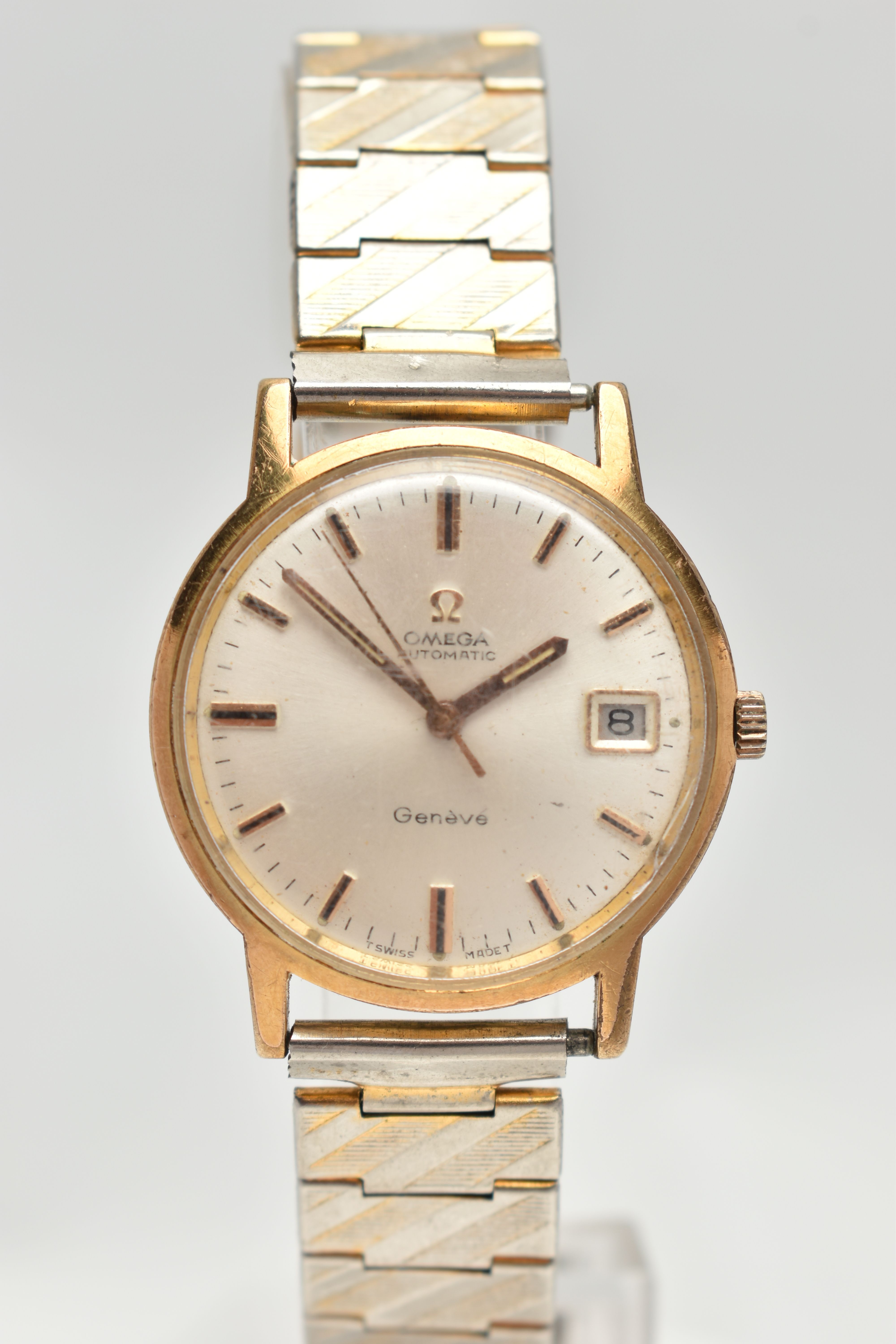 AN ‘OMEGA’ WRISTWATCH, automatic movement, round dial signed ‘Omega’ automatic Geneve, baton
