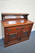 AN EDWARDIAN WALNUT SIDEBOARD, with a raised mirror back, two drawers and panelled cupboard doors,