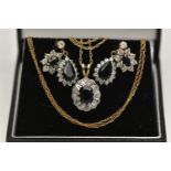 A 9CT GOLD SAPPHIRE CLUSTER PENDANT NECKLACE AND TWO PAIRS OF EARRINGS, the oval cluster pendant set