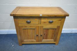 A LIGHT OAK SIDEBOARD, with three drawers, width 100cm x depth 47cm x height 79cm (condition:-