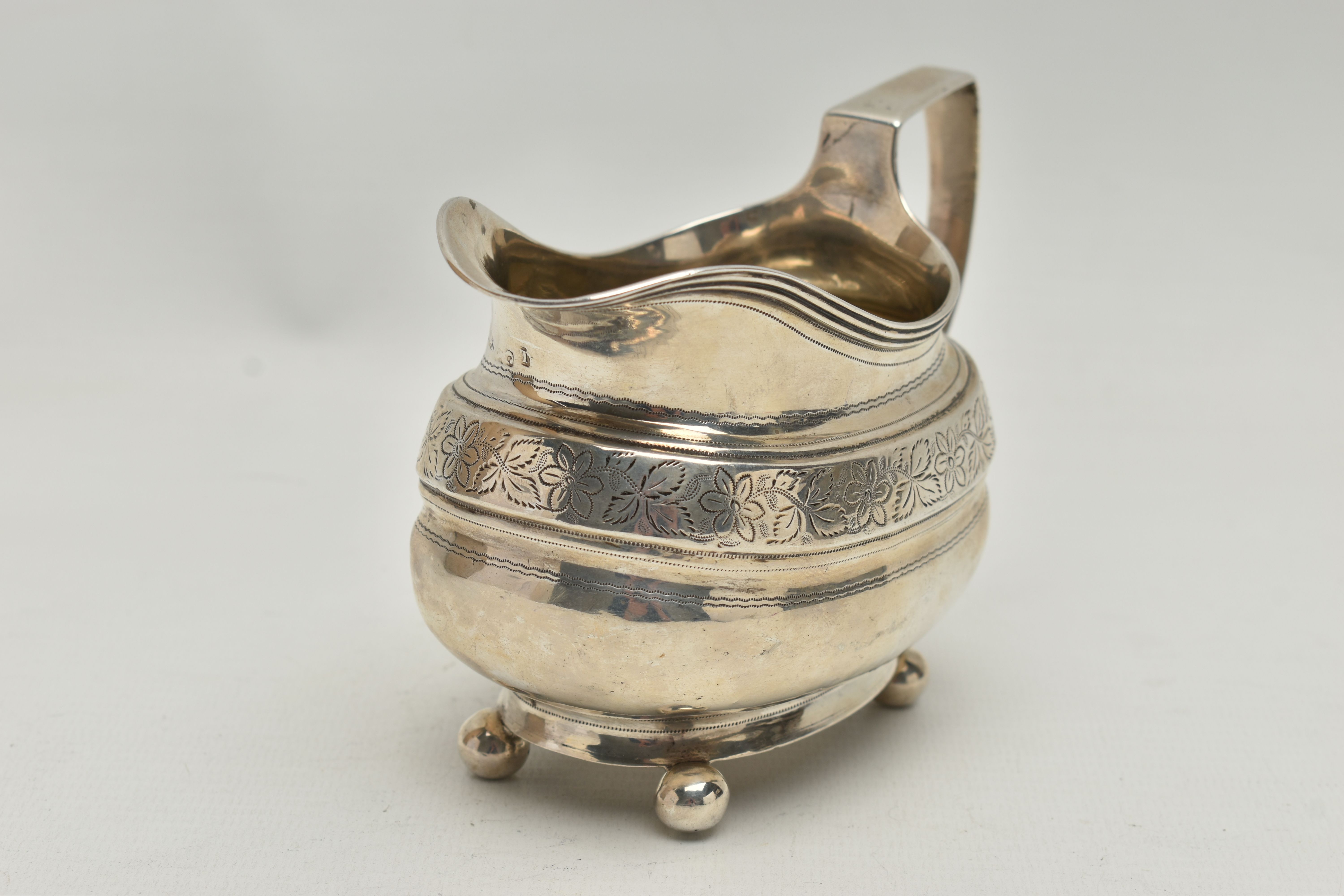 A GEORGE III SILVER HELMET SHAPED MILK JUG OF SHAPED OVAL FORM, angular handle, wriggle work and - Image 2 of 5