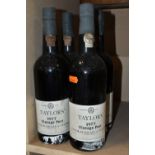 FOUR BOTTLES OF TAYLOR'S 1977 VINTAGE PORT, bottled in Oporto by Taylor, Fladgate & Yeatman, 21%