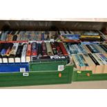 FOUR BOXES OF BOOKS containing approximately 105 titles in hardback and paperback format of