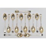 A SET OF TWELVE EDWARDIAN SILVER TEASPOONS AND MATCHING SUGAR TONGS, gilt bowls, foliate engraved