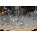 A COLLECTION OF ASSORTED GLASSWARE, including a part suite of unbranded drinking glasses, three