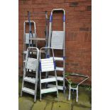 FIVE SETS OF LADDERS comprising four sets of aluminium ladders/stepladders and a vintage set of