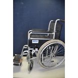 A DRIVE SELF PROPELLED WHEELCHAIR with footrests