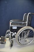 A DRIVE SELF PROPELLED WHEELCHAIR with footrests