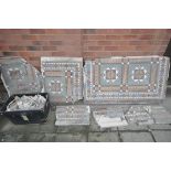 A SELECTION OF VICTORIAN MOSAIC TILES, mainly all one pattern, some sections attached to concrete