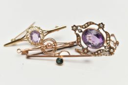 FOUR BROOCHES, the first set with an oval cut amethyst with a split pearl surround, in an unmarked