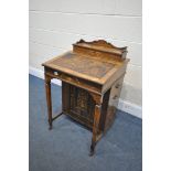 A LATE 19TH CENTURY ROSEWOOD AND MARQUETRY INLAID DAVENPORT, with a hinged top enclosing