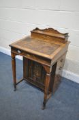 A LATE 19TH CENTURY ROSEWOOD AND MARQUETRY INLAID DAVENPORT, with a hinged top enclosing