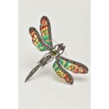 A WHITE METAL PLIQUE A JOUR BROOCH, in the form of a dragonfly, peridot and marcasite set body and