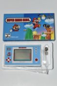 SUPER MARIO BROS GAME & WATCH BOXED, box only has minor wear and tear, system's batteries need