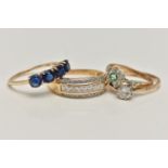 FOUR GEM SET RINGS, the first a 9ct yellow gold ring set with four circular cut vivid blue stones,