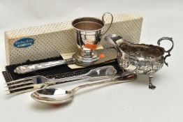 A SMALL PARCEL OF SILVER, comprising a George III silver sauce boat of oval form with S scroll