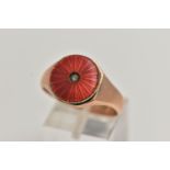 A GENTS 9CT GOLD SIGNET RING, featuring a circular red guilloche enamel ring head set with a single,