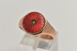 A GENTS 9CT GOLD SIGNET RING, featuring a circular red guilloche enamel ring head set with a single,