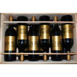 TWELVE BOTTLES OF CHATEAU D'ISSAN 1990 Margaux Grand Cru Classe en 1855, 12.5% vol. 750ml, fill