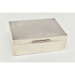 AN ELIZABETH II SILVER RECTANGULAR CIGARETTE BOX, textured finish to the hinged cover, cedar wood