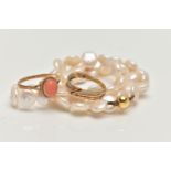 TWO RINGS AND A CULTURED PEARL NECKLACE, the first a coral cabochon ring, bifurcated shoulders