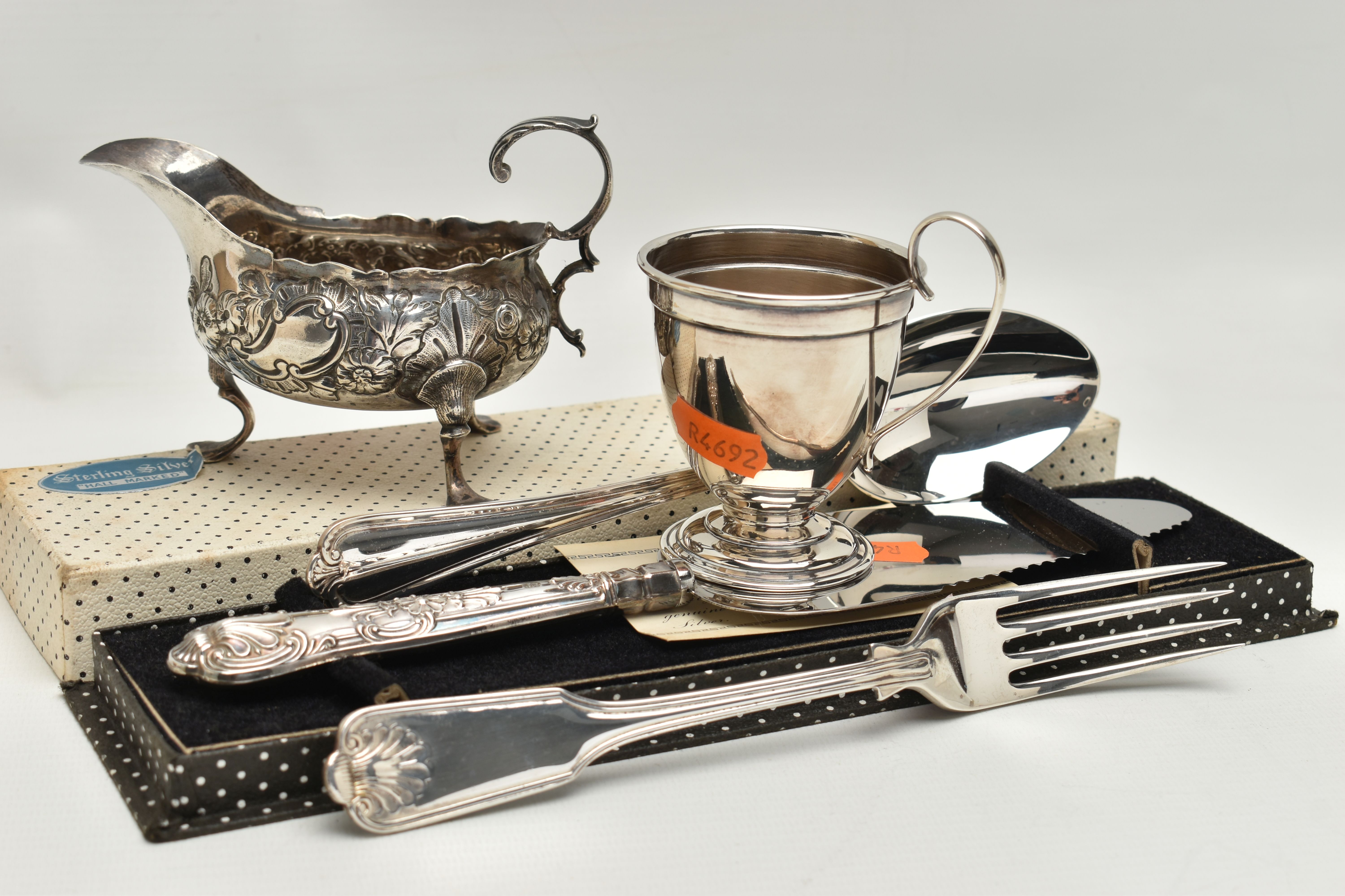 A SMALL PARCEL OF SILVER, comprising a George III silver sauce boat of oval form with S scroll - Image 5 of 5