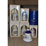 BELL'S WHISKY, Seven Royal Commemorative Porcelain Decanters, comprising the Wedding of H.R.H.