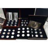 A CASED DISPLAY OF SILVER PROOF CROWN COINS, The History of the RAF, Two Trays of 9 Eighteen