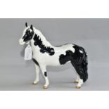 A BESWICK PINTO PONY, model no 1373, first version piebald, bearing printed backstamp, height 16.5cm