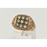 A 9CT GOLD NINE STONE SIGNET RING, square signet set with nine colourless stones assessed as