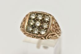 A 9CT GOLD NINE STONE SIGNET RING, square signet set with nine colourless stones assessed as