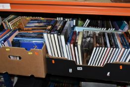 FOUR BOXES OF BOOKS containing approximately 112 titles, mostly in hardback format, on the