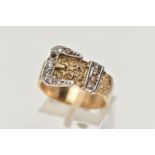 A 9CT GOLD BUCKLE RING, yellow belt with scrolling pattern, white metal buckle detail, set with