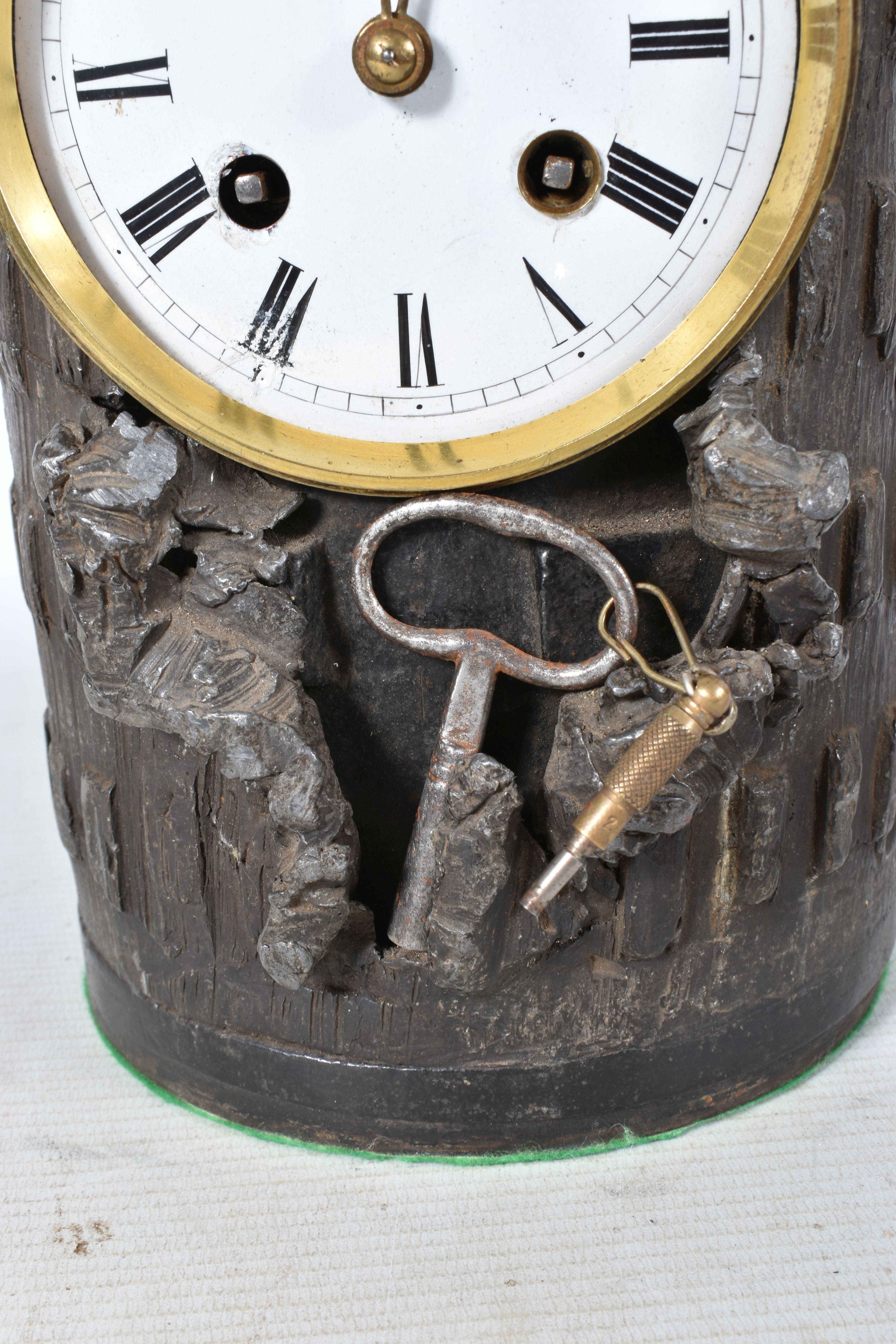 A TRENCH ART MANTLE CLOCK FORMED FROM A BOMB CASING, fitted with a late 19th century enamel dial and - Image 4 of 11