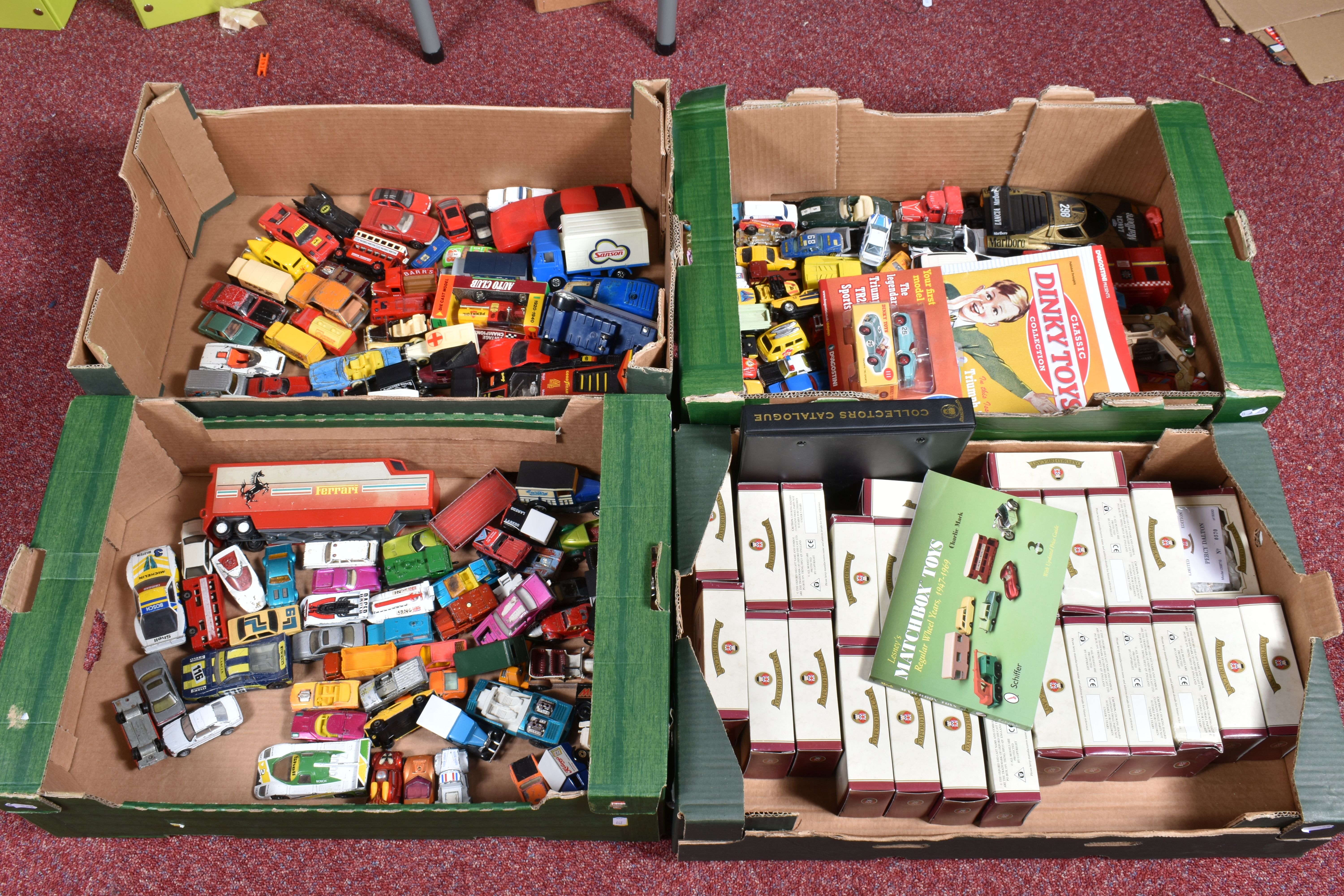 FOUR BOXES OF BOXED AND UNBOXED MODEL VEHICLES, to include a tray of Oxford Die-Cast, 27 in total,