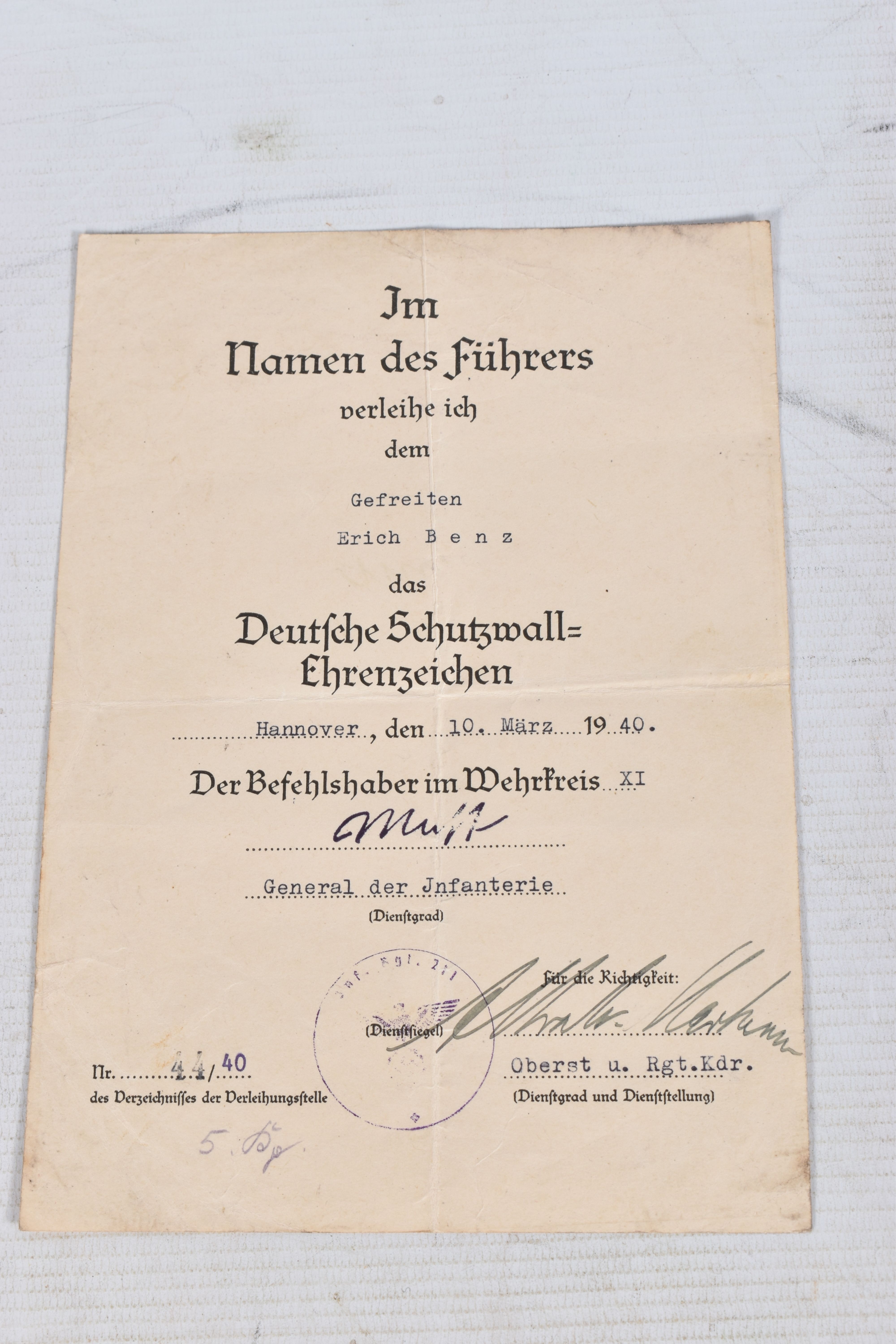 PAPERS RELATING TO ERICH BENZ, CORPORAL IN THE REICH ARMY, to include an award for Protective Wall - Image 4 of 7