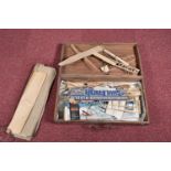 A WOODEN BOX CONTAINING A QUANTITY OF PART BUILT VINTAGE BALSA WOOD GLIDERS, together with