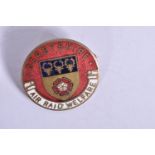 A SCARCE DERBYSHIRE AIR RAIDWELFARE BADGE, this features the Coat of Arms red, gold, black and white