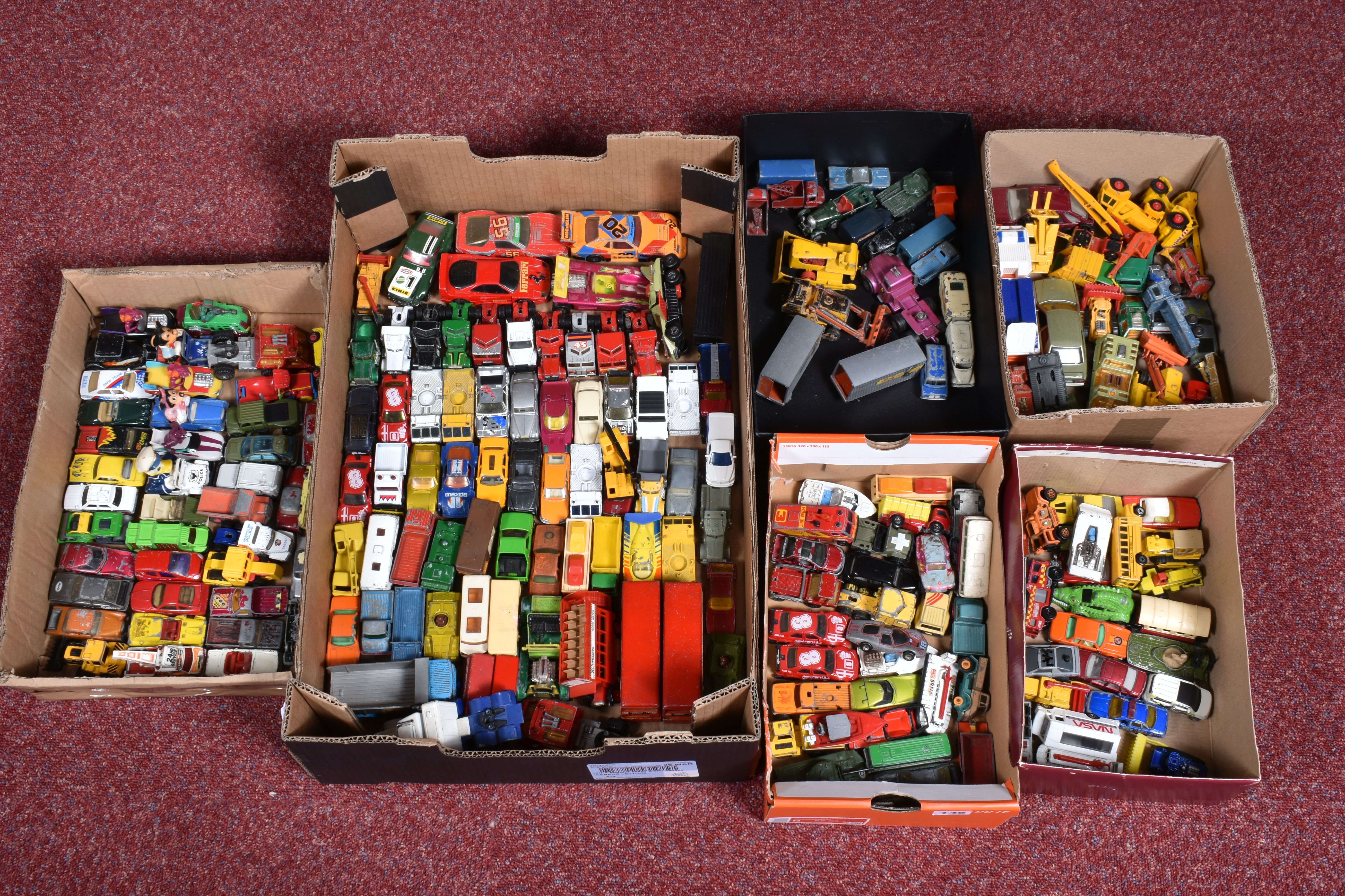 A QUANTITY OF UNBOXED PLAYWORN DIECAST MATCHBOX VEHICLES, presented in six boxes to include