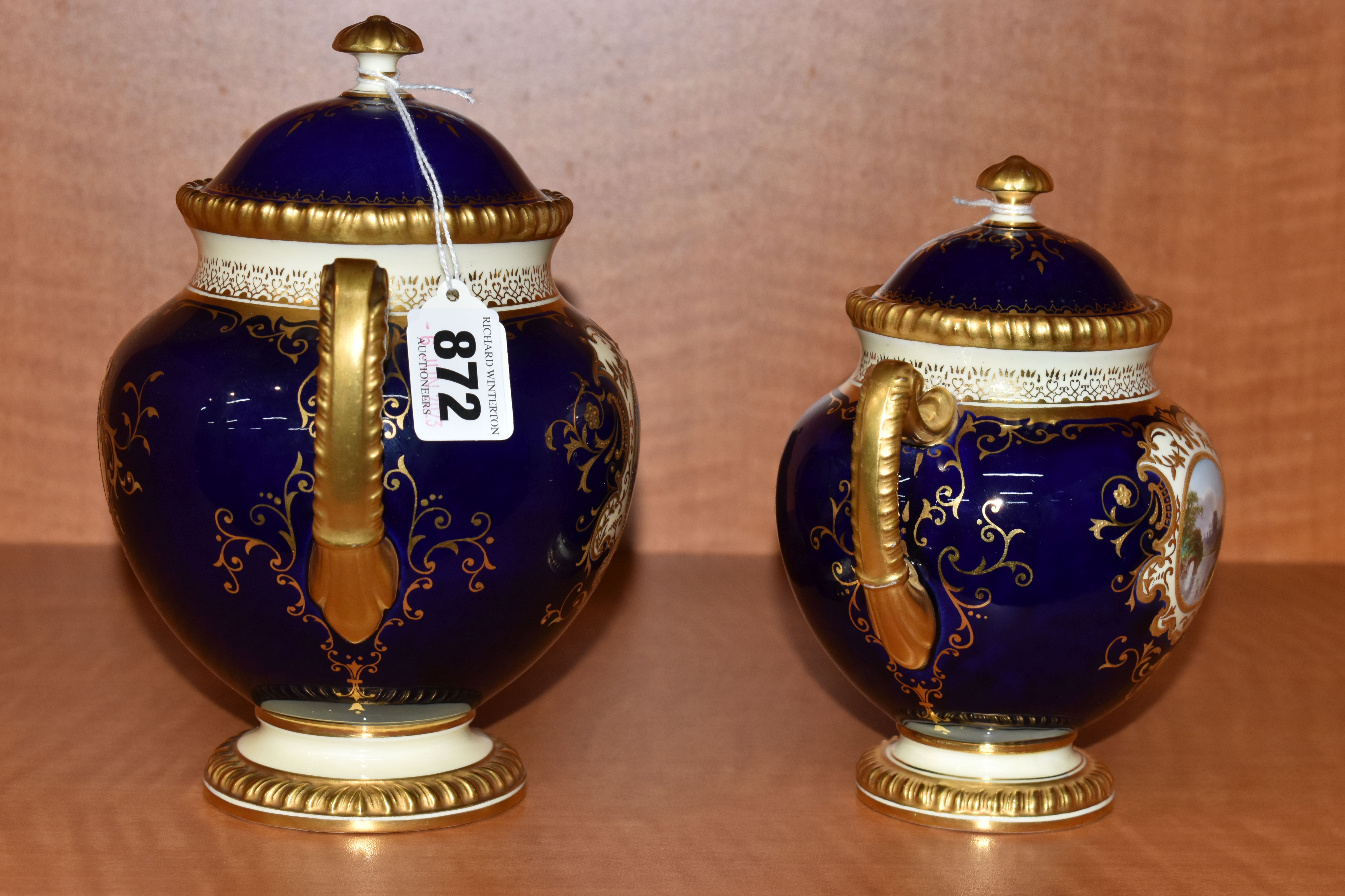 TWO EARLY 20TH CENTURY COALPORT TWIN HANDLED VASES AND COVERS, blue, pale yellow and gilt ground, - Image 4 of 12