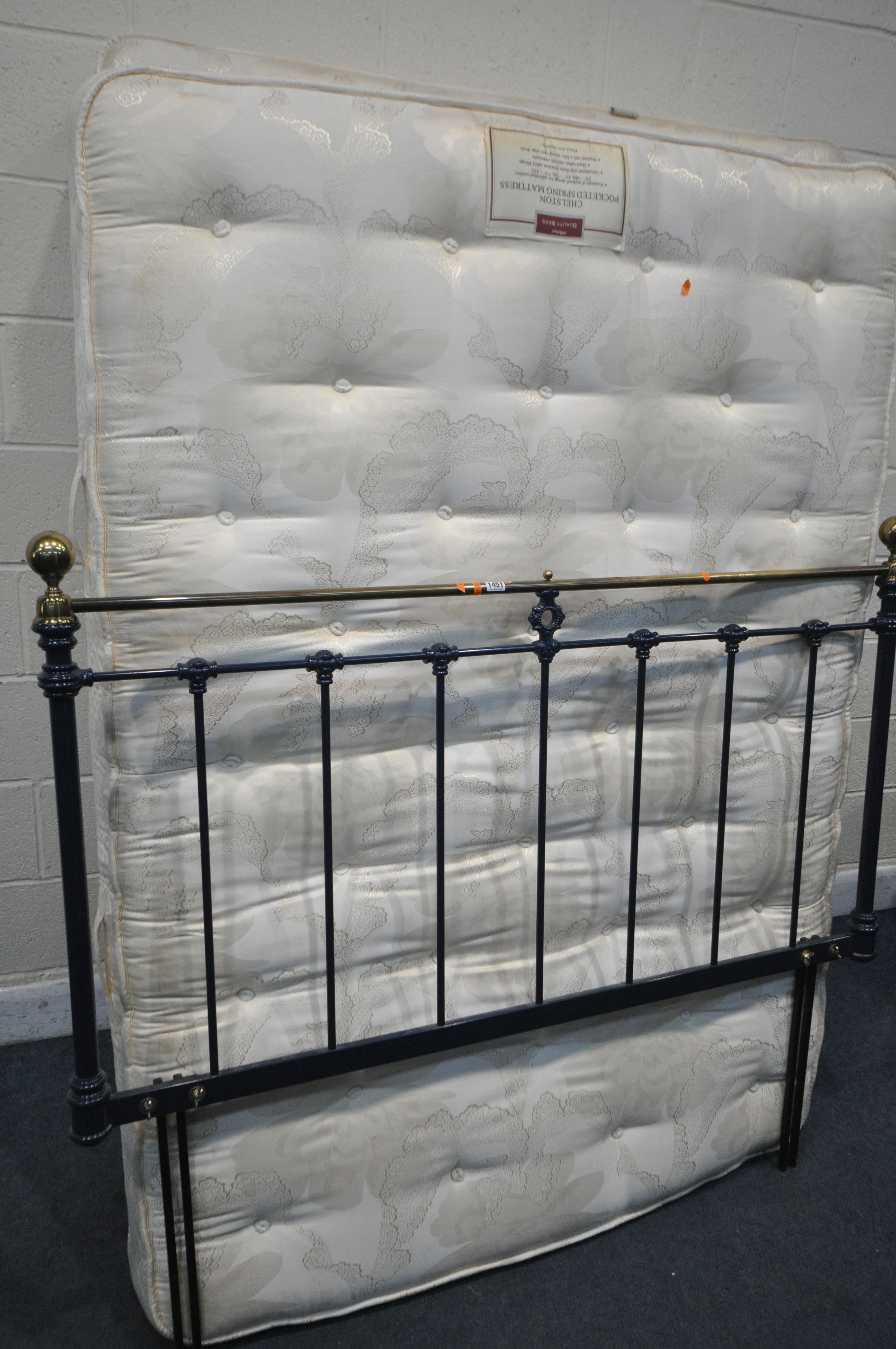 A ST.MICHEALS 4FT 6 DEVAN BED, with a pocketed spring mattress, and metal headboard