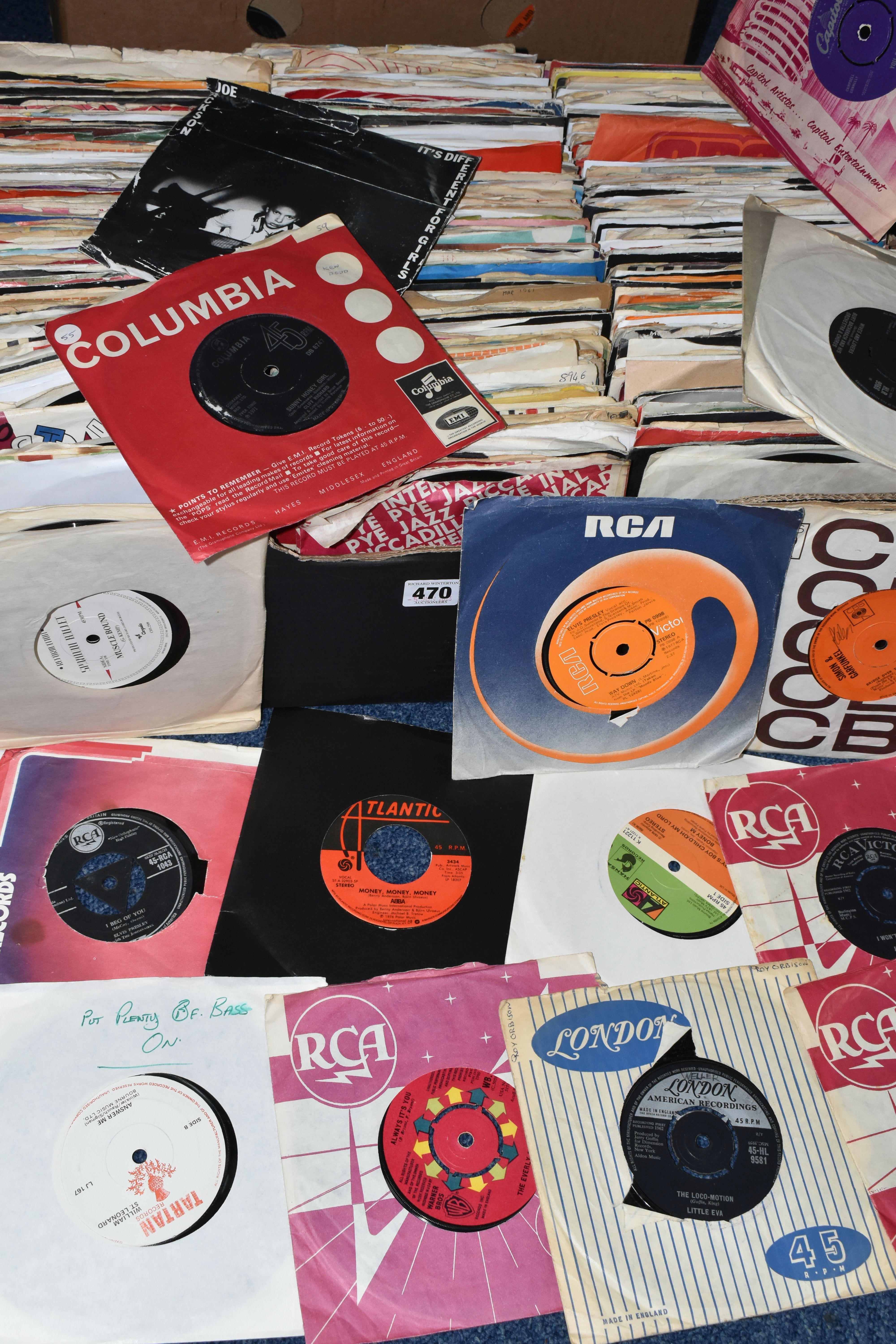 A BOX OF VINYL SINGLES, over three hundred records, artists to include Elvis Presley, Simon and