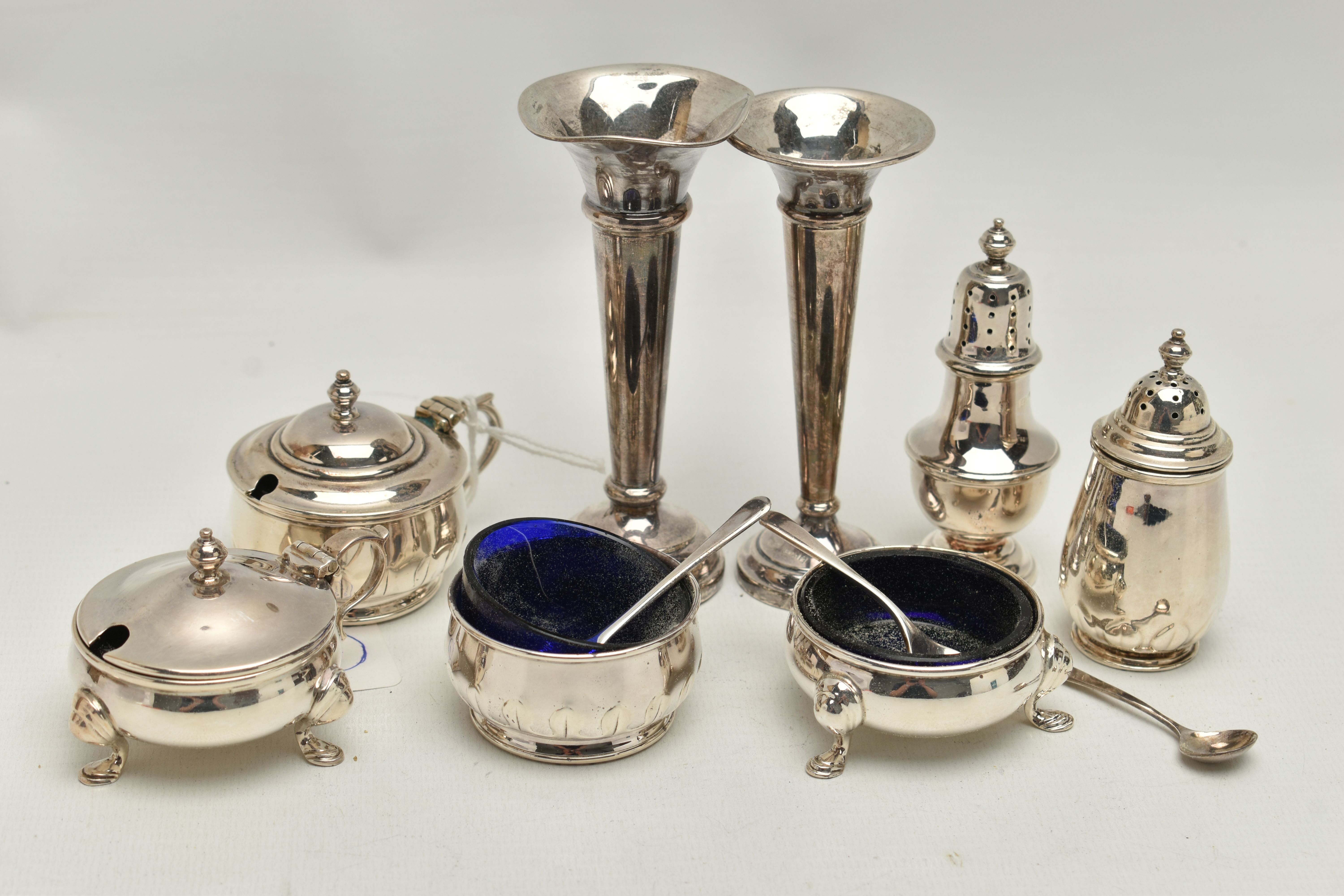 A PARCEL OF 20TH CENTURY SILVER CRUET ITEMS, POSY VASES, ETC, comprising two three piece cruet sets,