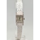 A LADYS 18CT WHITE GOLD, DIAMOND SET 'ROLEX' WRISTWATCH, manual wind, round silver dial signed '