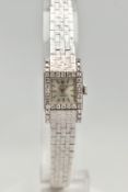 A LADYS 18CT WHITE GOLD, DIAMOND SET 'ROLEX' WRISTWATCH, manual wind, round silver dial signed '