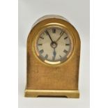 A BRASS CASED ALARM CLOCK, key wound, round gold dial, Roman numerals, in a brass case, together